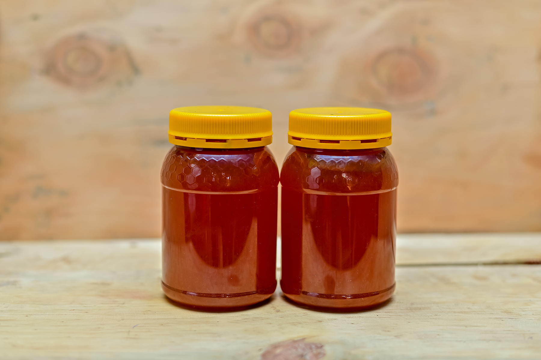 Raw Honey in Plastic Tins